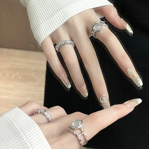 Moonstone and zircon ring set with silver French pleated design for a minimalist style