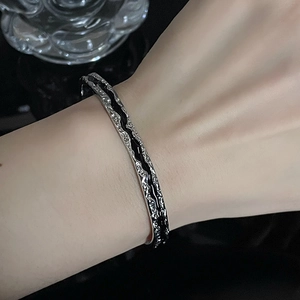 Irregular wrinkled texture silver open cuff bracelet with black enamel wavy inlay