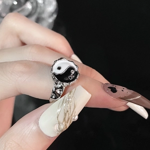 Minimalist Yin-Yang ring for women with textured hammered silver finish and bold aesthetic