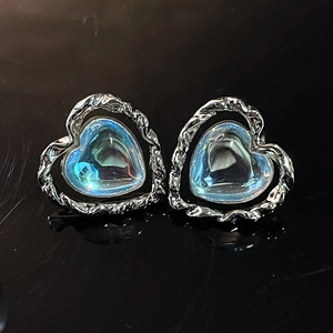 Moonstone heart earrings with silver lava texture metal frame and blue iridescent stones