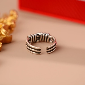 Vintage layered woven knot open ring in Thai silver finish with oxidized texture