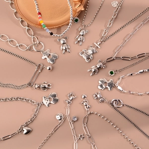Collection de colliers et bracelets à pendentif ours rétro en argent S925