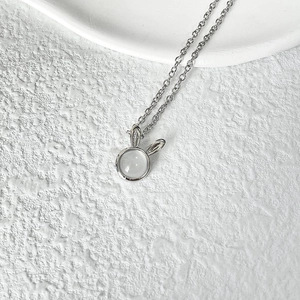 Elegant rabbit pendant necklace with moonstone on a minimalist silver chain for women
