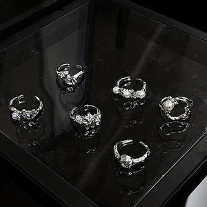 Set of six silver adjustable open rings with white pearls and sparkling gemstones