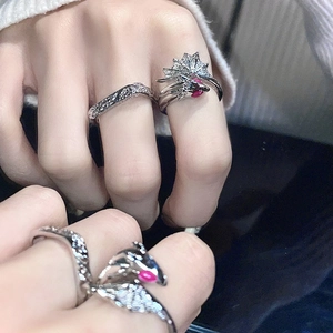 Retro silver flying dragon ring with pink gemstone and irregular textured band