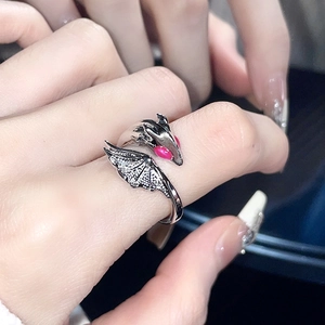 Gothic silver dragon ring with red eyes and wing detail in vintage finish style