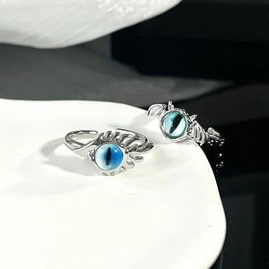 Adjustable gothic devil eye ring set featuring blue eye stones and bat wing design