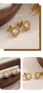 Detail of 18K gold plated earring set with heart and round cubic zirconia studs