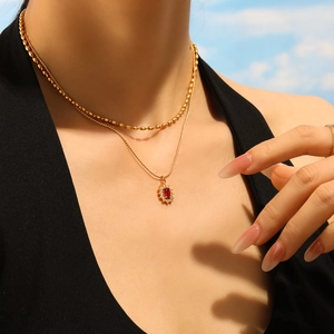 French chic gold-plated stainless steel double-layer necklace with oval ruby pendant and zircons