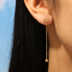 Elegant gold heart-shaped threader earrings with feather texture and bead drop detail