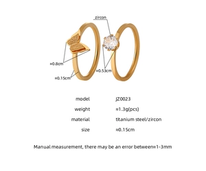 Dimensiones detalladas de los anillos de acero titanio con mariposas y circonita redonda