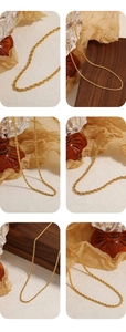 Detail einer goldenen gedrehten Kordelkette mit metallischer Textur und Glanz