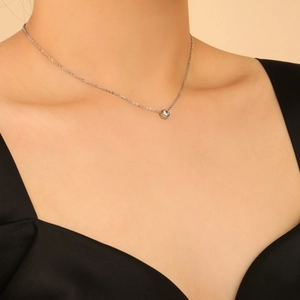 Minimalist silver zircon solitaire necklace with O-chain on model for women fashion
