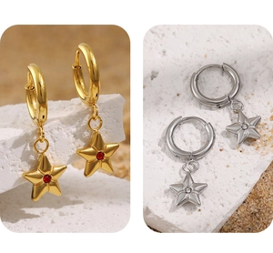 Detailed comparison of gold and silver star earrings with vibrant zircon stones