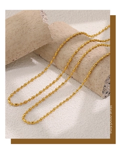 Macro shot of 18K gold plated stainless steel oval bamboo bead chain necklace details