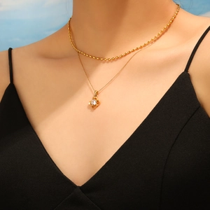 Double layered gold clover necklace with zircon pendant on elegant beads chain