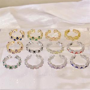 Set di orecchini regolabili con zirconi colorati e finitura in oro e argento pregiato