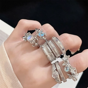 Retro silver ring set with moonstone and zircon stones featuring brushed metal texture