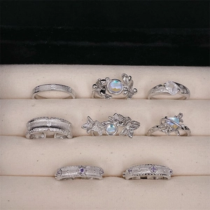Eight-piece silver ring set with zircon, moonstone, and vintage floral designs