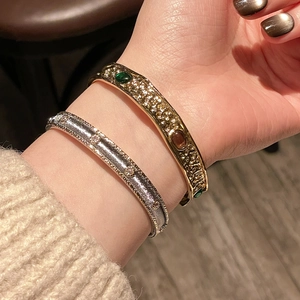 Vintage two-tone wide open cuff bracelets with gemstones and textured metal finish