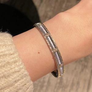 Vintage two-tone wide open cuff bracelet with brushed silver finish and gold bead trim