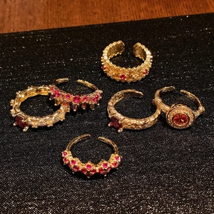 Vintage style gold adjustable rings set with colorful zircons and intricate engraving