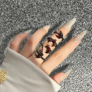 Gothic dark red crescent rose four-piece ring set with punk claw and scorpion tail