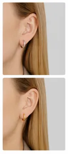 Detailed view of gold and silver hoop earrings with hammered texture on ear models