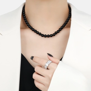 Minimalist black onyx bead necklace with polished finish and chic fashion style