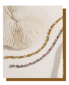 Detailed view of gold and silver coffee bean bracelets with sparkling zircon stones