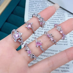 Sparkling pink zircon ring set with 7 pieces featuring heart butterfly and star patterns