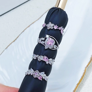 Elegant floral and butterfly ring set with pink and white cubic zirconia stones