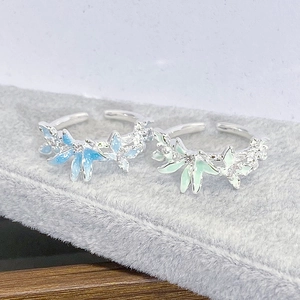 Bague papillon en émail vert menthe frais avec finition argentée et accents en zircone