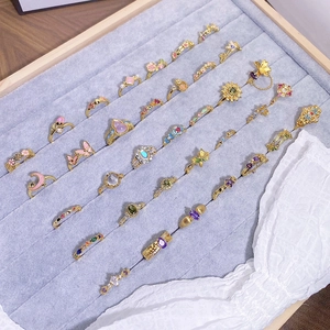 Vintage enamel zircon rings set with butterfly and sunflower motifs in gold finish