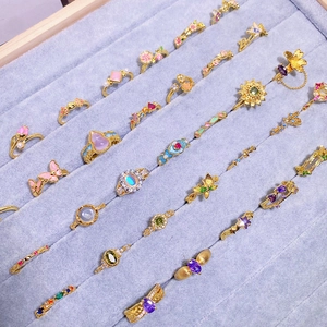 Vintage enamel and zircon open rings set with floral and butterfly designs