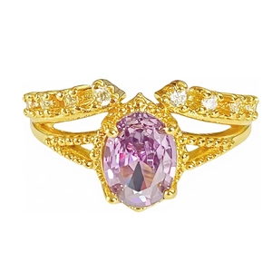 Vintage goldener Ring mit ovalem violettem Edelstein und weißen Zirkonia-Akzenten