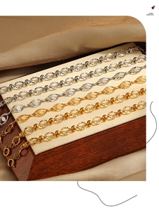 Detailed close-up of textured oval links on gold and silver titanium steel bracelets