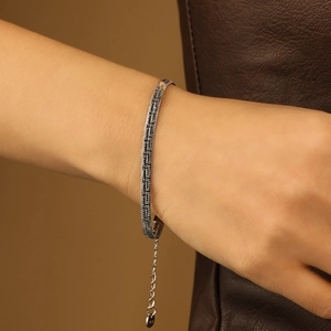 Elegant silver snake bone chain bracelet with scale texture and adjustable extension