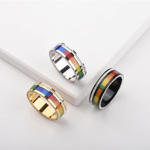 Rainbow stripe titanium steel rings with pavé crystals in gold, silver and black