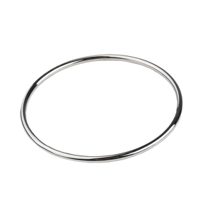 Minimalist geometric circular solid bangle in polished titanium steel with gold plating