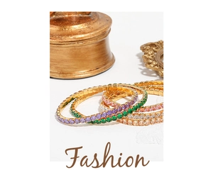 Close-up of multicolored zircon tennis bracelets with gold metal base and elastic band