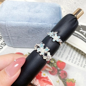 Ensemble de bagues en argent avec papillon bleu menthe et fleurs serties de zircones
