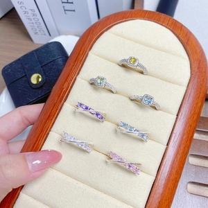 Exquisite set of seven silver rings with colorful cubic zirconia in butterfly and square cuts