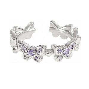 Elegant silver open ring featuring butterfly motifs with purple and white zircon crystals