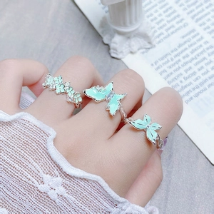 Bague ajustable papillon et fleur en émail vert menthe pour femme avec finition argent