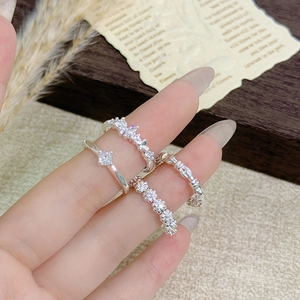 Stackable silver zircon rings set including crown and daisy designs for women
