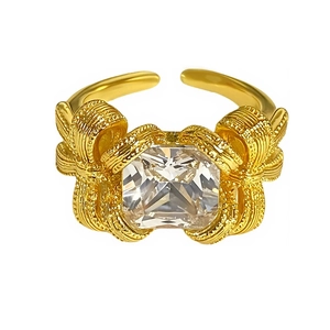 Bague vintage ajustable dorée avec grand zircon carré et détails de nœud en métal