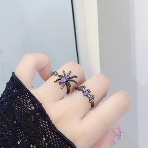 Gothic style spider and bat open rings set with purple teardrop zircon and black plating