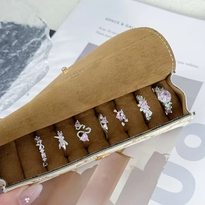 7-teiliges Set versilberte Ringe mit rosa Zirkonia im Herz- und Schmetterlingsdesign