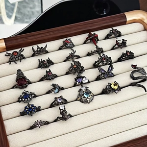 Gothic dark style rings set featuring spiders and bats with colorful gemstones